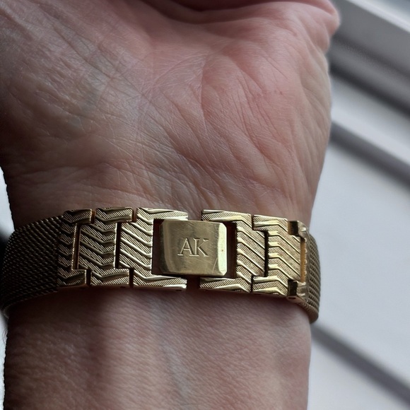 Anne Klein Diamond Collection
Gold Tone Hidden Face Thin
Strap Watch main image 3
